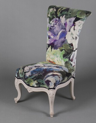 A 19th Century grey painted Prie-dieu chair, upholstered in floral patterned material, raised on cabriole supports 90cm h x 49cm w x 47cm d 