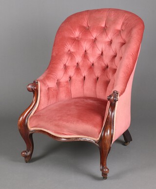 A Victorian mahogany tub back chair upholstered in pink buttoned material, raised on cabriole supports 95cm h x 67cm w x 50cm d (seat 30cm x 34cm) 