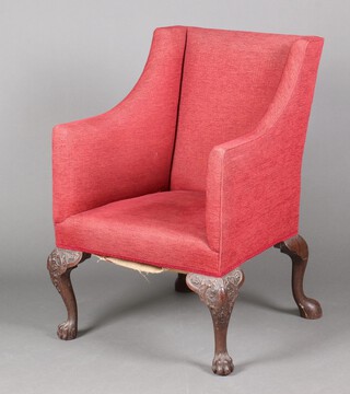 A Georgian style library chair upholstered in red material, raised on front carved cabriole supports with ball and claw feet, the back with plain outswept cabriole supports  91cm h x 57cm w x 63cm d (36cm x 36cm) 