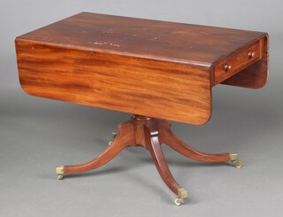 A 19th Century mahogany pedestal Pembroke table fitted a drawer, raised on a turned column and tripod base with brass caps and casters 72cm h x 107cm w x 54cm d 