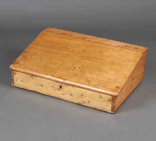 A 19th Century pine clerk's slope with brass escutcheon 23cm x 71cm x 49cm 