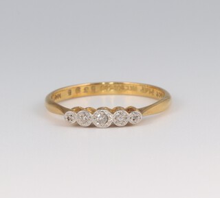 An 18ct yellow gold 5 stone diamond ring 2.3 grams, size O