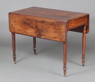 A 19th Century mahogany Pembroke table fitted a drawer, raised on turned supports with brass caps and casters 69cm h x 91cm w x 49cm d 