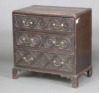 A 17th/18th Century carved oak chest of 3 drawers with replacement brass swan neck drop handles, raised on bracket feet 175cm h x 74cm w x 45cm d  