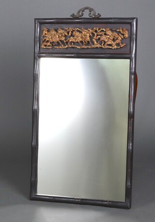 A 20th Century rectangular plate mirror contained in a Chinese style bamboo effect frame, the top with carved panel depicting horseman 95cm x 54cm 