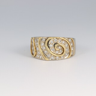 An 18ct yellow gold diamond whorl ring size N, 7.5 grams 