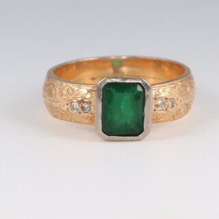 A 22ct yellow gold ring set with a green paste stone, size Y 1/2, 13.6 grams 