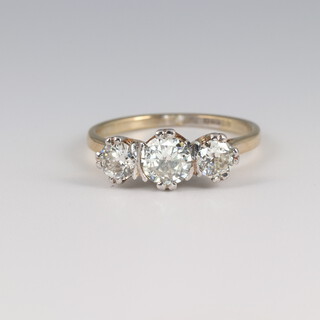 An 18ct yellow gold 3 stone brilliant cut diamond ring approx. 1.3ct, size P 1/2, 3.8 grams 