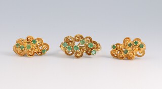 An 18ct yellow gold paste set ring size N and a pair of ditto ear studs, gross weight 10 grams 