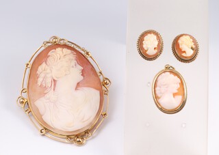 A 9ct yellow gold carved cameo rope twist portrait brooch 50mm, a pair of ear studs and a pendant, gross weight 25.6 grams 
