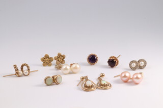 Eight pairs of 9ct yellow gold gem set ear studs, gross weight 12 grams