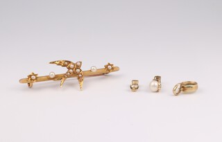 An Edwardian 15ct seed pearl bar brooch with a swallow 3 grams, a 9ct opal pendant, cultured pearl pendant and diamond pendant, gross weight 1.3 grams 