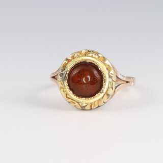 A yellow gold, testing as 9ct, amber ring, size I 1/2, 3.2 grams 