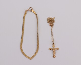 A 9ct yellow gold bracelet 18cm, a ditto necklace 38cm and a ditto cross pendant 2.5 grams 