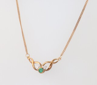 A 9ct yellow gold emerald and diamond necklace, the emerald 0.02ct, the 2 diamonds 0.01ct, 40cm, 2.7 grams 