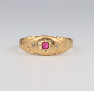 An 18ct yellow gold ruby and diamond ring, size R, 3.1 grams 
