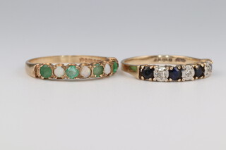 Two 9ct yellow gold gem set rings, sizes M and N 4.8 grams