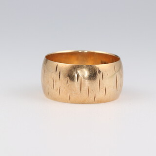 A 9ct yellow gold wedding band, size L 1/2 4.6 grams 