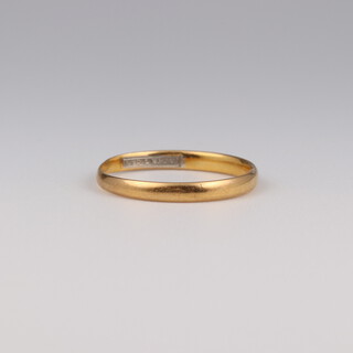 A 22ct yellow gold wedding band, size L, 1.3 grams 