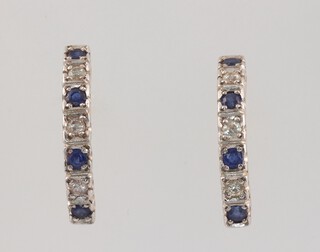 A pair of 9ct yellow gold sapphire and diamond ear hoops for pierced ears, the diamonds approx. 0.01ct, sapphires 0.01ct, 1.7 grams