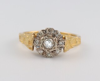An 18ct yellow gold diamond cluster ring, size N, approx. 0.6ct, 4.5 grams 