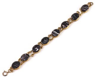 A Victorian gilt bracelet set with agate and hardstone 20cm 