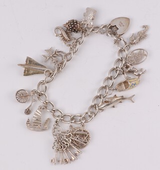 A silver charm bracelet, 40 grams