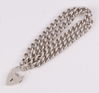 A silver double strand bracelet with heart padlock, 50 grams