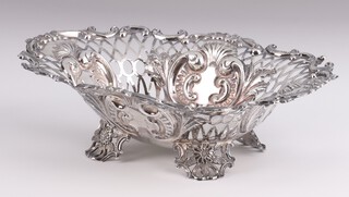 A Victorian pierced silver dish with scroll panels on pierced floral feet, London 1895, retailed by Mappin & Webb, 19cm, 142 grams 