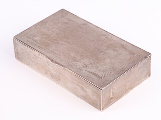 An Art Deco rectangular silver engine turned cigarette box Birmingham 1934, 14cm, engraved inscription, gross weight 368 grams including liner