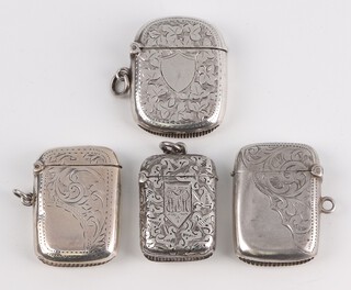 A Victorian silver vesta with engraved decoration Birmingham 1899 25mm and 3 others, 51 grams 