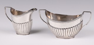 A Victorian silver demi-fluted sugar bowl and cream jug London 1900, 156 grams 