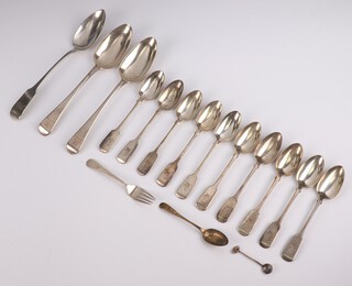 A George III Old English silver table spoon, London 1798 together with a quantity of spoons mixed dates and makers, 532 grams 