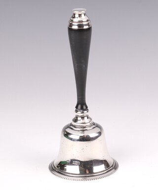 A silver hand bell with ebony handle Birmingham 1986 15cm