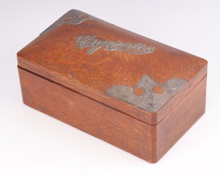 An Edwardian oak cigarette box with silver mounts 17cm 