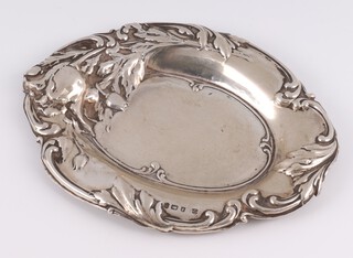 An Edwardian repousse silver quatrefoil dish decorated with flowers Birmingham 1904, 28 grams, 12cm 