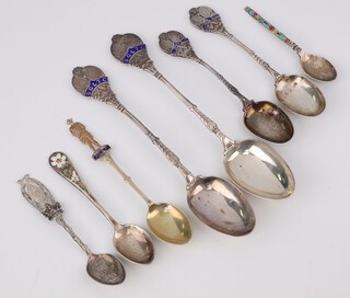 A silver and enamelled tennis competition spoon Birmingham 1927, ditto 1929, 5 others and a plated spoon, weighable silver 184 grams 