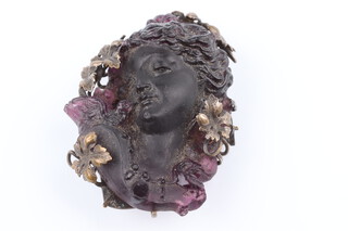 A Victorian carved hardstone portrait brooch with gilt metal mounts 