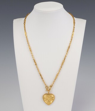 A 22ct yellow gold necklace 46cm and a ditto heart shaped pendant decorated a dragon, 38.6 grams 