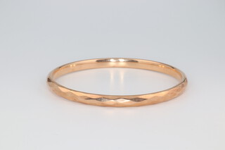 A 9ct yellow gold bangle 11.2 grams, 7.5cm internal diameter