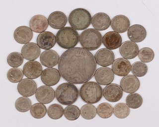 A small quantity of pre-1947 coinage including an 1889 crown, shillings, sixpences and threepence, 126 grams