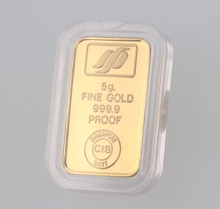 A Singapore Mint 5 gram 999.9 standard proof gold ingot 