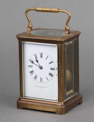 Robert S Roberts Paris, a 19th Century French carriage clock with 7cm enamelled dial, Roman numerals, marked Robert S Roberts Paris, striking on gong, contained in a gilt metal case with key 13cm x 9cm x 8cm 