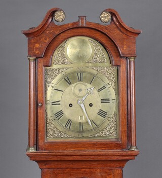 Richard Smith of Newport, an 18th/19th Century 8 day striking longcase clock, the 29cm brass arched dial marked Richard Smith Newport, having a subsidiary second hand, calendar aperture and polished steel hands, contained in an oak case 191cm h, complete with pendulum, weights and key, section of cross banding missing to the door, split to base of the trunk 