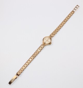 A lady's 9ct yellow gold Lanco wristwatch contained in a 15mm case, 12.1 grams including the glass 