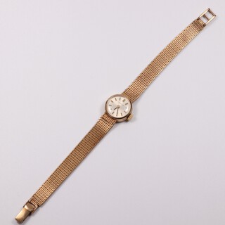 A lady's 9ct yellow gold Certina wristwatch with 17mm case, contained on a ditto mesh bracelet, gross weight including glass 17.5 grams 