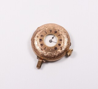 A lady's 12ct yellow gold half hunter fob watch contained in a 35mm, 30 grams gross including movement and glass 