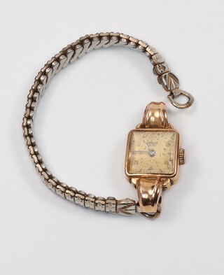A lady's 18ct yellow gold cased Exactus wristwatch on a gilt bracelet