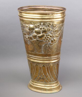 An oval embossed brass "grape" carrier stick stand with embossed basket of fruit 60cm h x 34cm w x 21cm d 