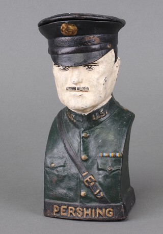 An American First World War cast iron money box in the form of General Pershing 20cm h x 9cm w x 7cm d